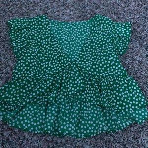 very cropped and ruffled top